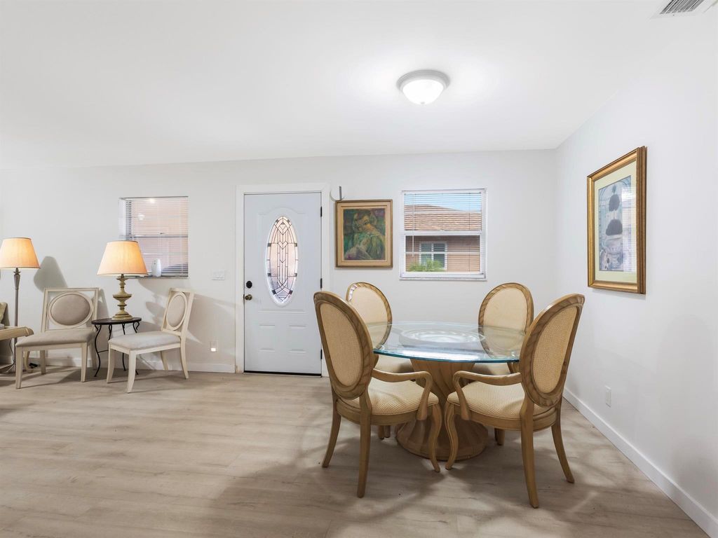 Photo of 725 Whippoorwill Lane, Delray Beach, FL 33445 (MLS # R11119411)