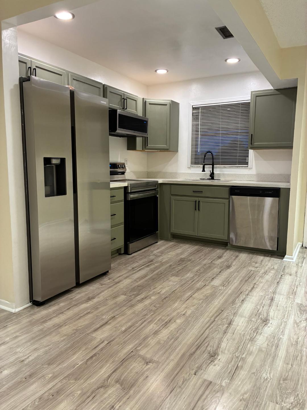 Tastefully renovated apartment with new appliances, new flooring, water heater and a cold AC. Updated bathrooms, washer and dryer in unit.