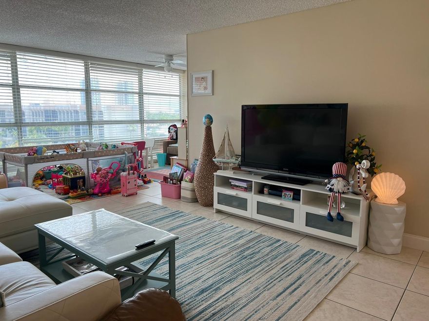 Fully furnished, very clean corner unit with intracoastal views. 2 Beds 2 Baths with a smaller room that could be used as an office or den. Very spacious living room with formal dining area. New tile floors throughout, and floor to ceiling windows. Kitchen and bathrooms have granite counters, both bedrooms have walk-in closets with an additional closet in the entry way. Beautiful pool alongside the canal that was recently renovated. Walking distance to the beach, Walmart, Publix, Starbucks, Ross and many other stores and restaurants. ***Owner will remove furniture if necessary***