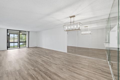 Photo of 4725 E Lucerne Lakes Blvd Boulevard E #114, Lake Worth, FL 33467 (MLS # B26021113)
