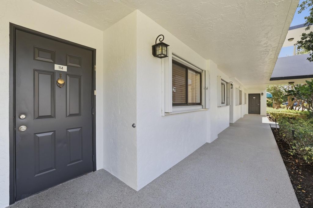 Photo of 4725 E Lucerne Lakes Blvd Boulevard E #114, Lake Worth, FL 33467 (MLS # B26021113)