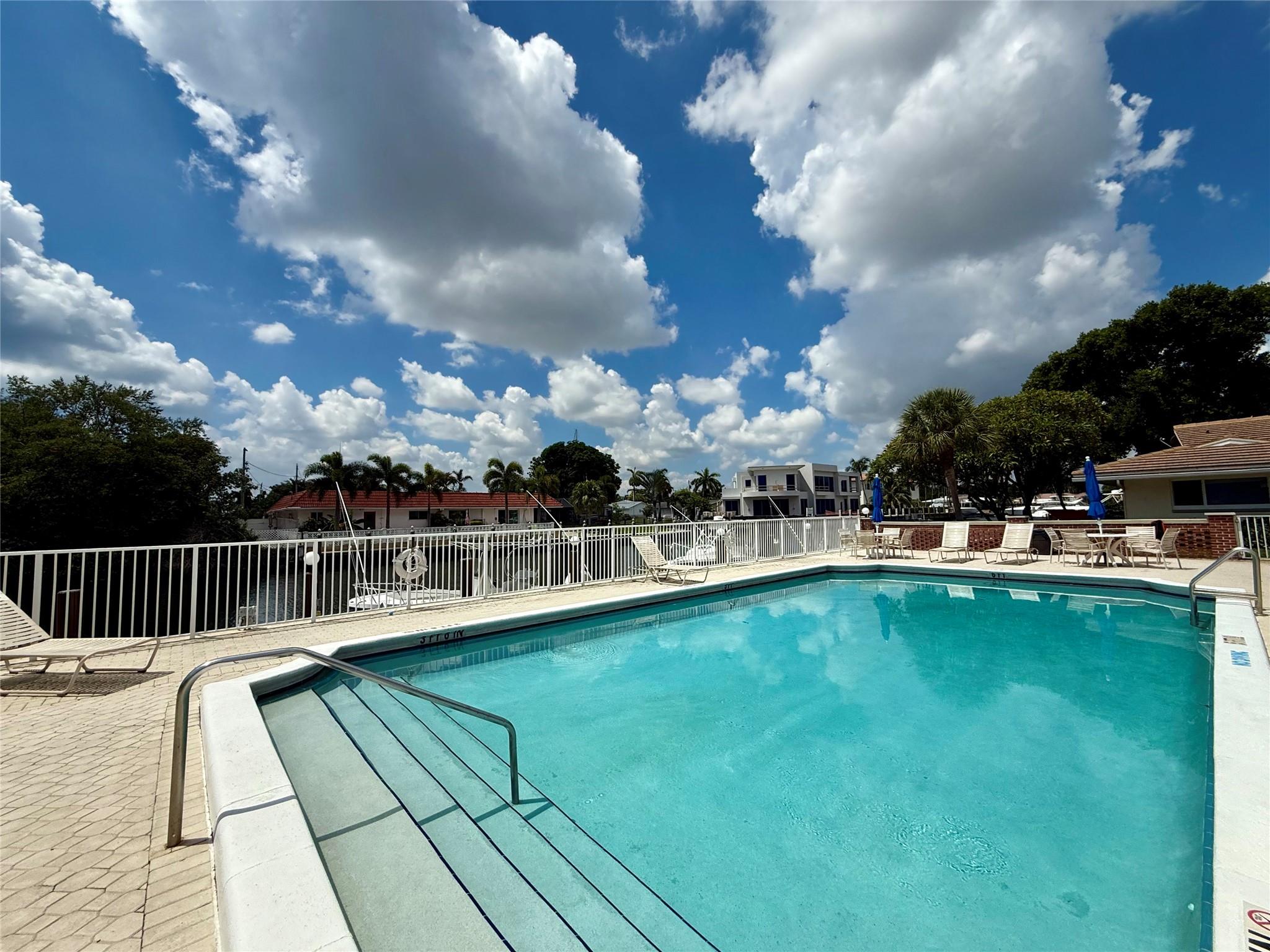 WALKING DISTANCE TO BEACH!! Fully Remodeled One Bedroom Unit Located In The Cozy WaterFront Marine Colony Community, All Ages! IMPACT PROOF WINDOWS! New Driftwood-Style Tile Flooring, New Kitchen, New Appliances, Freshly Painted, Large Screened-in Porch, Huge 8x5 Walk-in Closet, Assigned Parking Spot Right in Front Of The Unit, Water Is Included. The Community Is Located On A Canal And Just Across From Alsdorf Park, It Also Has A Pool, Gym Dock, BBQ, Picnic Area Right On The Canal, Access For Kayak, Private Storage, Pets Are Allowed!!