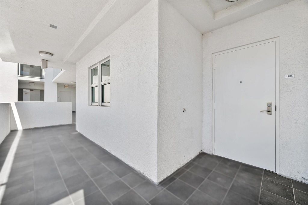 Photo of 15051 Royal Oaks Lane, North Miami, FL 33181 (MLS # B26019056)