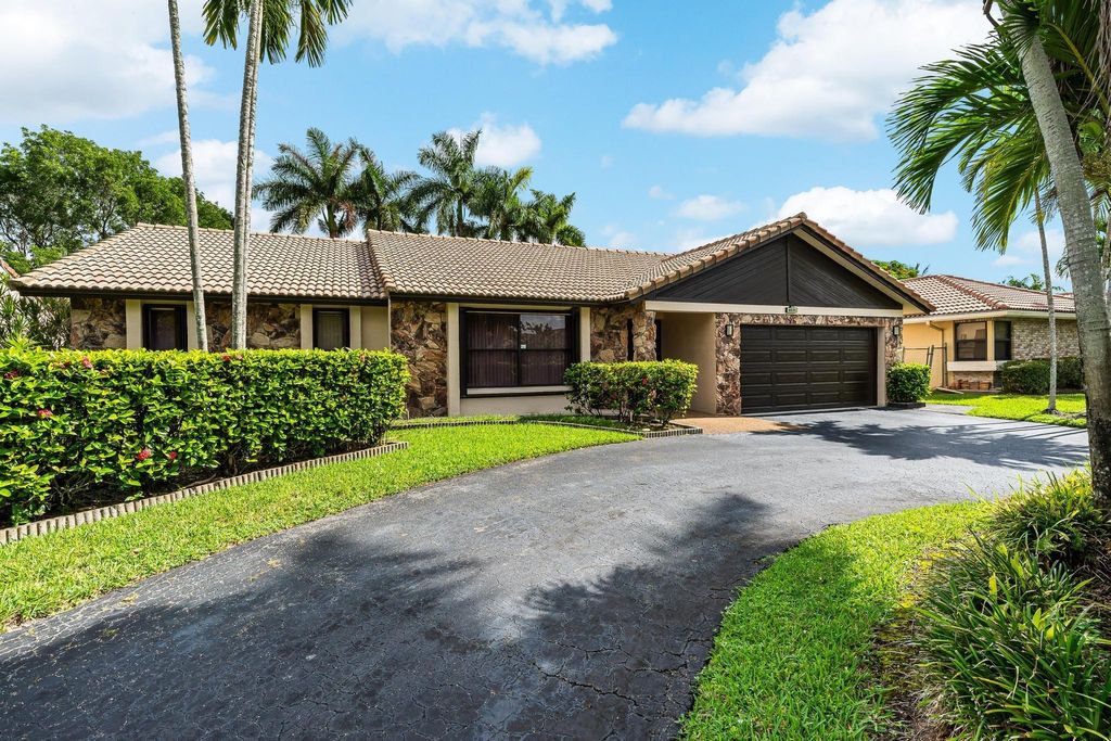 Photo of 6631 NW 52nd Street, Coral Springs, FL 33067 (MLS # F10450759)