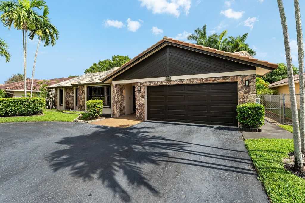 Photo of 6631 NW 52nd Street, Coral Springs, FL 33067 (MLS # F10450759)