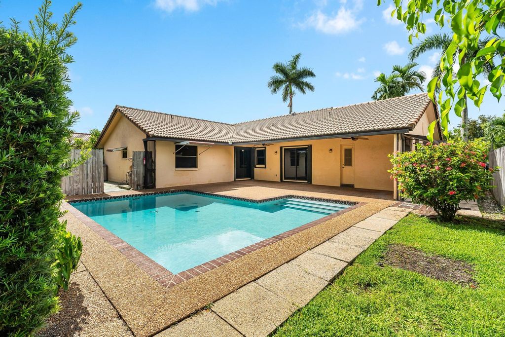 Photo of 6631 NW 52nd Street, Coral Springs, FL 33067 (MLS # F10450759)