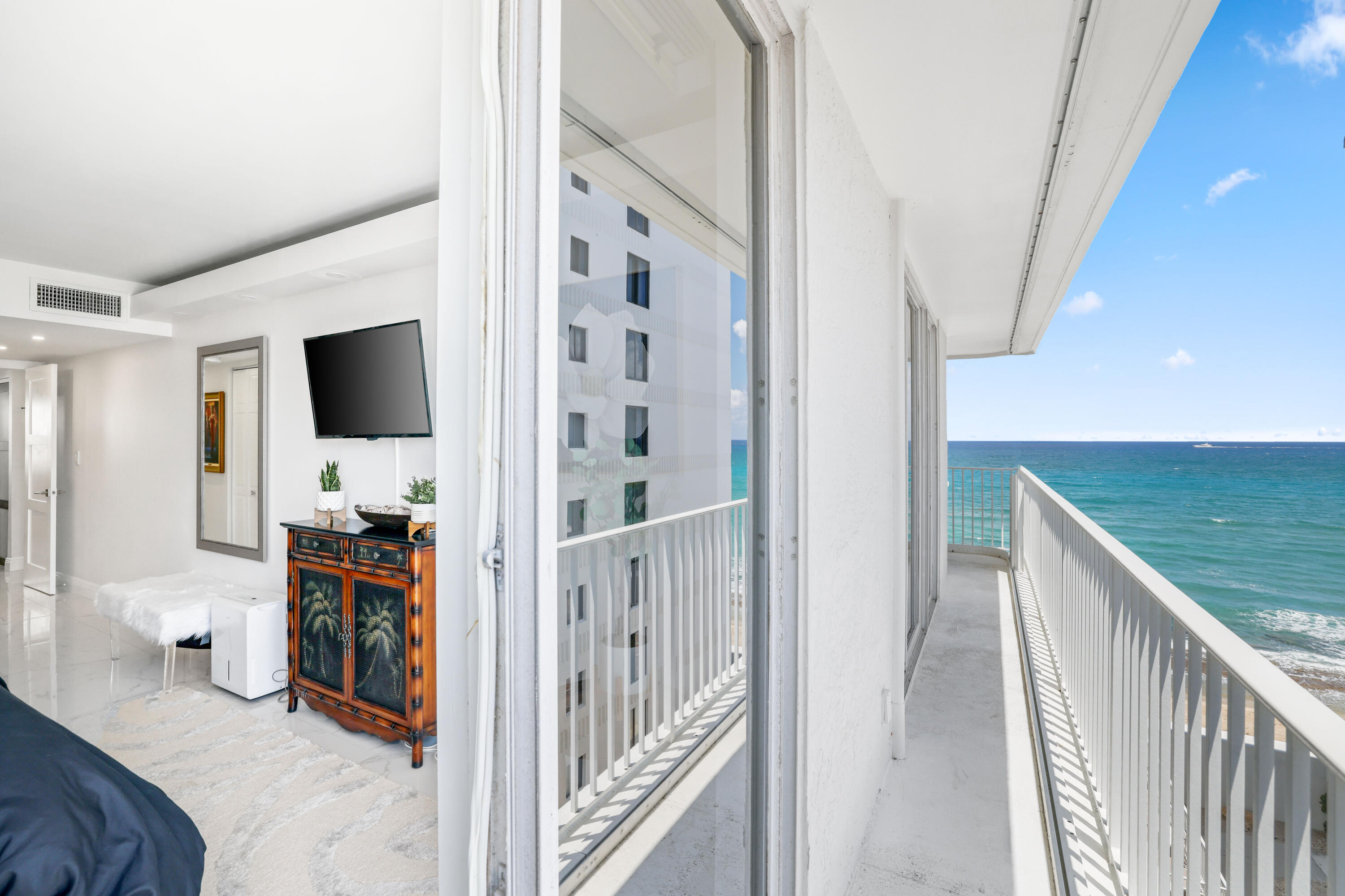 Prime Location! Best-Priced Renovated Oceanfront Condo in Palm BeachEnjoy stunning direct ocean views from this beautifully updated condo--no pending assessments, all have been paid! Fully renovated in 2021, featuring a modern kitchen with calcite stone countertops, sleek European cabinetry, and new Whirlpool appliances. Washer and dryer conveniently located in-unit. White marble-look porcelain flooring, ambient cove lighting, and spa-like bathrooms with LED mirrors create a luxurious feel. Community amenities include a pool, fitness center, and picnic area. Additional upgrades include a new AC, water heater, and a 2025 roof. Assigned parking included. Leasing permitted after one year. Furniture is negotiable!