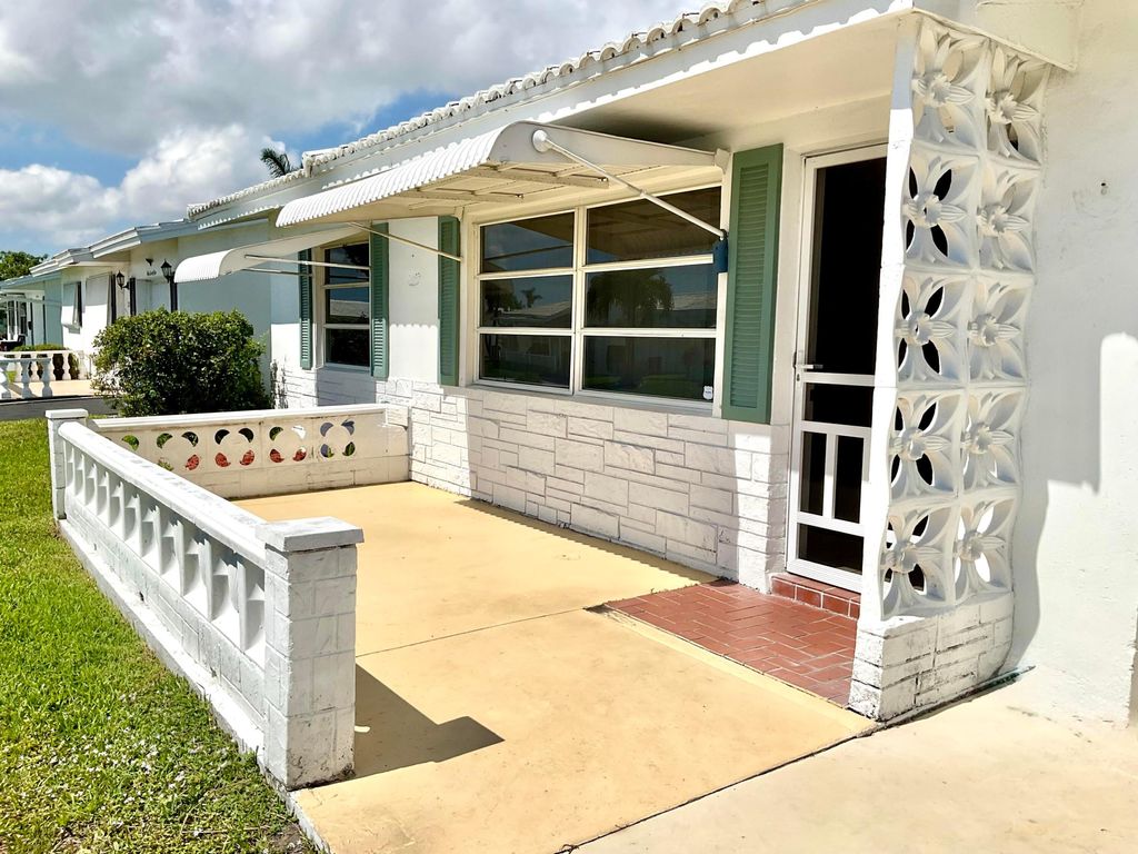 Photo of 119 SW 10th Court, Boynton Beach, FL 33426 (MLS # B26028957)