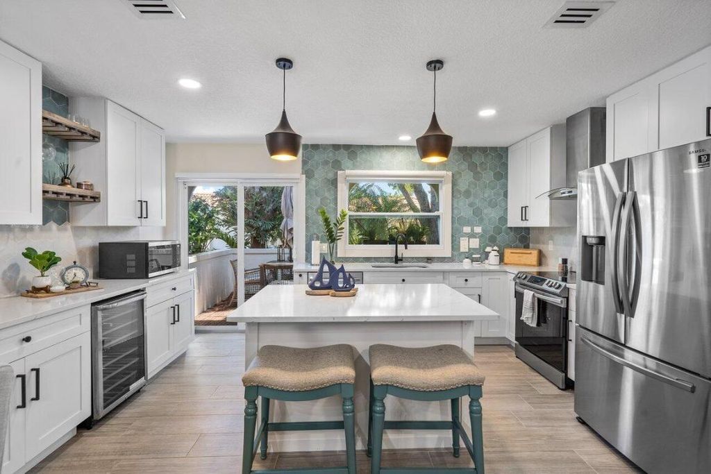 Photo of 1474 Via Del Sol, Jupiter, FL 33477 (MLS # R10914579)