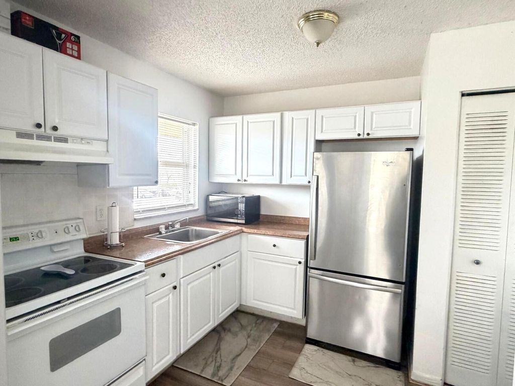 Photo of 406 Lakeside Drive #208, Margate, FL 33063 (MLS # R11160199)