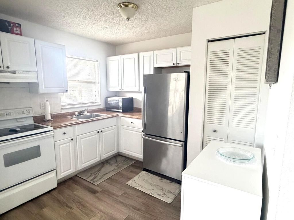 Photo of 406 Lakeside Drive #208, Margate, FL 33063 (MLS # R11160199)