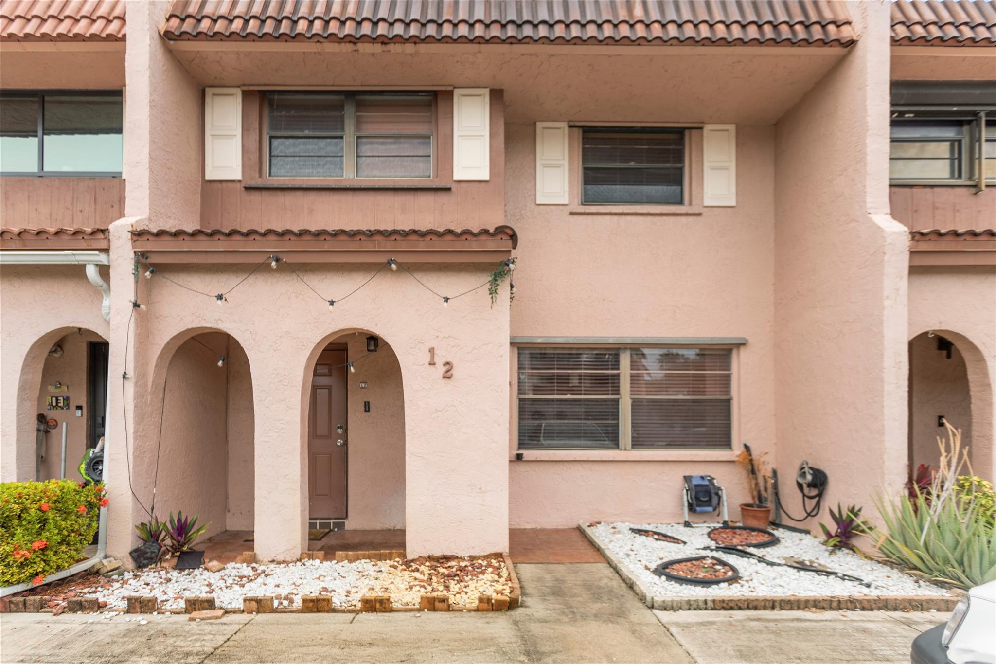 Beautiful 3 bedrooms and 2.5 bathrooms. Great location minutes away from major highways, functional and open layout in phase two of Village. All phase 2 units have concrete floors and ceiling fans. Flat ceilings and LED lights. Close to Broward Community college, FAU and Mcfatter. Waking distance to shopping plaza and dinning. Solid wood staircase, beautiful kitchen, enclosed balcony and screened in patio. Do not miss the opportunity to see this house.