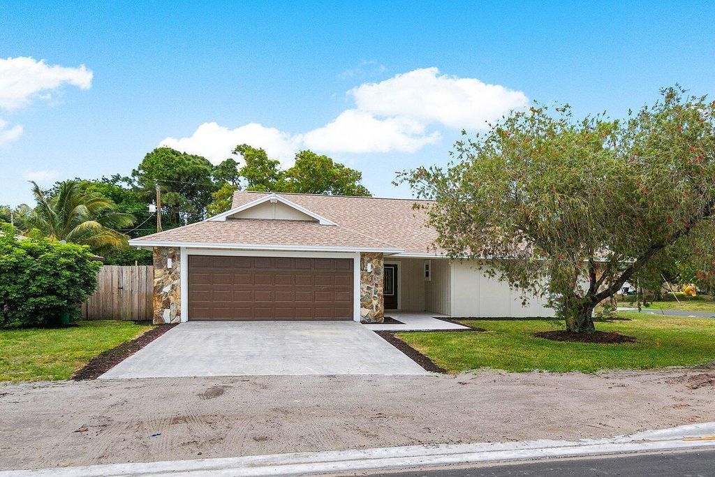 Photo of 1614 SE Floresta Drive, Port Saint Lucie, FL 34983 (MLS # R10978508)
