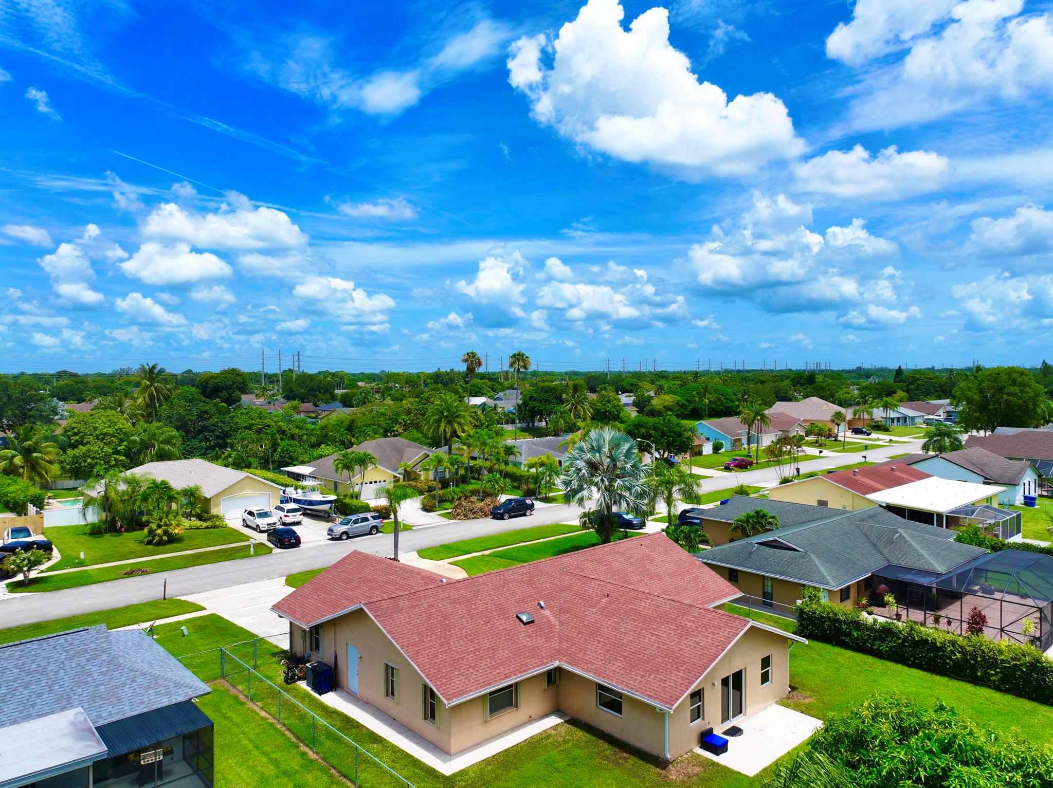WOW !!! 2666 TOTAL SQ FT !!! RARE FIND ** EXQUISITE RETREAT IN DESIRABLE LA MANCHA COMMUNITY IN ROYAL PALM BEACH FLORIDA !!! NO HOA ** OVERSIZED .34 ACRES WITH LOTS OF ROOM FOR POOL, FAMILY BARBQUE, KITCHEN GARDENING ** ***. WELL MAINTAINED 3 BEDROOM 2 BATHROOM 2CAR GARAGE PLUS 20X45 BONUS ROOM- CAN BE USED AS 4TH BEDROOM, GAME ROOM, OFFICE/ EXERCISE ROOM !! DISCOVER YOUR DREAM HOME NESTLED IN COVETED LA MANCHA COMMUNITY !! THIS STUNNING RESIDENCE AT 187 BILBAO STREET, ROYAL PALM BEACH FLORIDA 33411- ELEGANTLY DESIGNED AND IMPECCABLY MAINTAINED - OFFERS THE PERFECT BLEND OF LUXURY, COMFORT, AND FLORIDA CHARM** STEP INSIDE TO A SPACIOUS, SPLIT FLOOR PLAN FLOODED WITH NATURAL LIGHT, FEATURING SOARING CEILINGS AND SOPHISTICATED FINISHES THROUGHOUT ** circular driveway !!