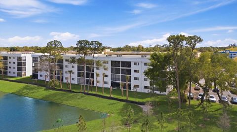 Photo of 4725 Lucerne Lakes Blvd Boulevard E #110, Lake Worth, FL 33467 (MLS # B26001451)