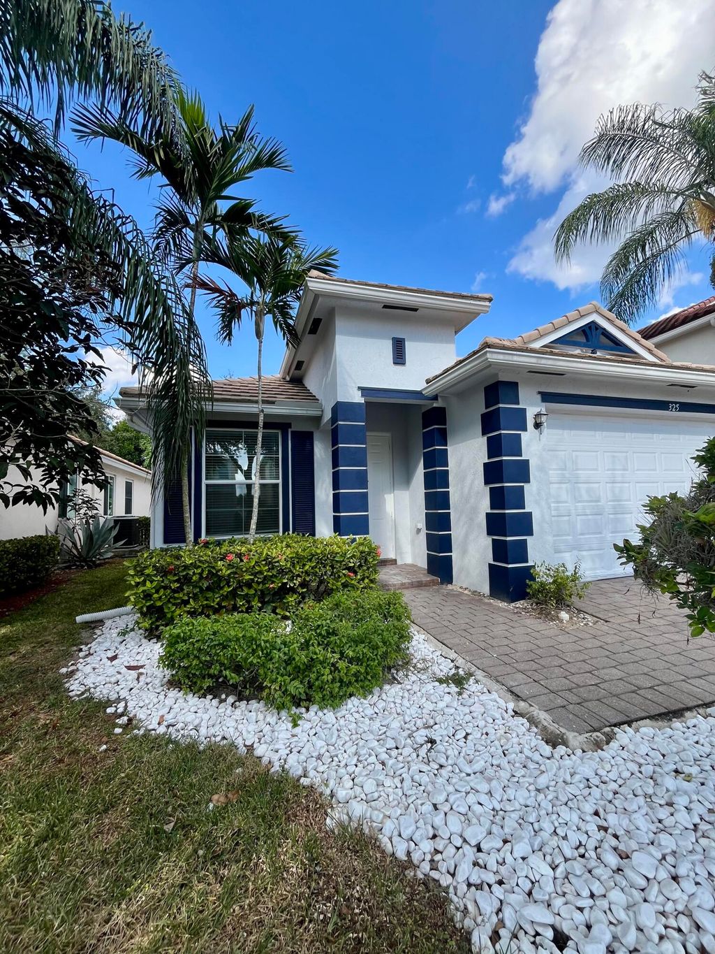 Photo of 325 Mulberry Grove Road, West Palm Beach, FL 33411 (MLS # R11141755)