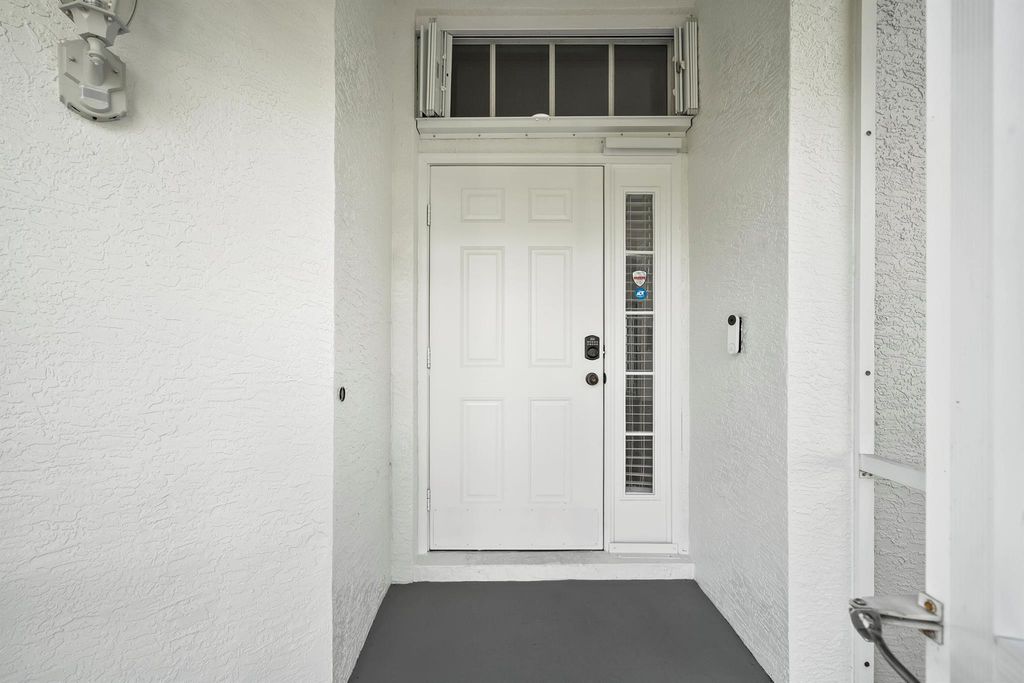 Photo of 1633 SE Clearmont Street, Port Saint Lucie, FL 34983 (MLS # R11100674)