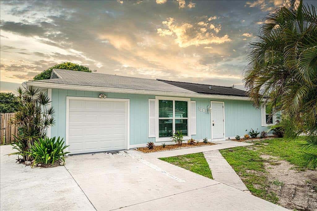 Photo of 1897 SW Cameo Boulevard, Port Saint Lucie, FL 34953 (MLS # R10726037)