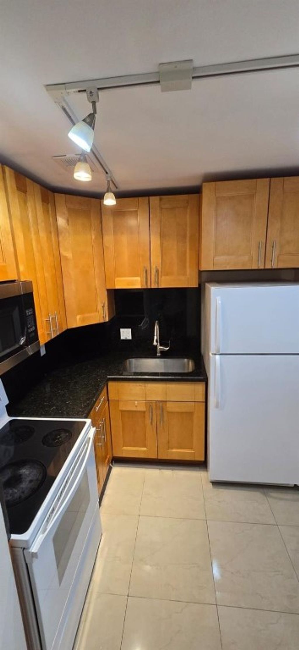 Photo of 3930 Crystal Lake Drive #215, Deerfield Beach, FL 33064 (MLS # F10502286)