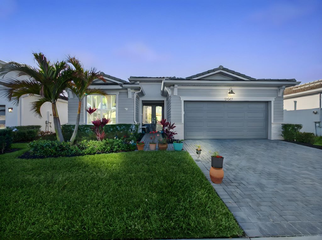 Photo of 12047 SW Viridian Boulevard, Port Saint Lucie, FL 34987 (MLS # R11169695)