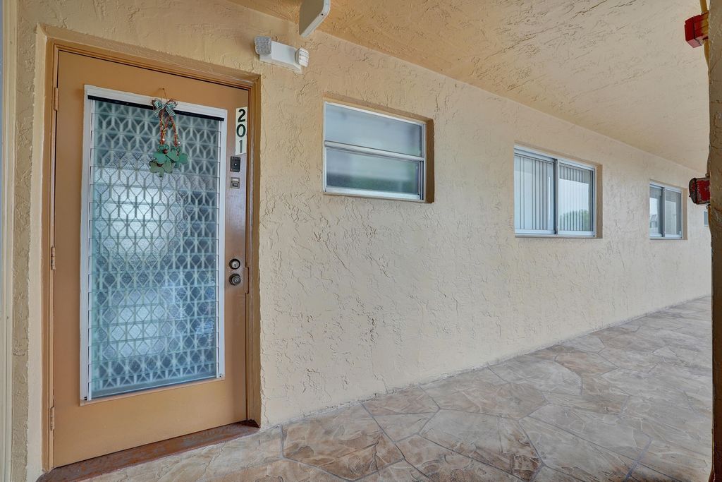 Photo of 6670 Royal Palm Boulevard #201- K, Margate, FL 33063 (MLS # B26016527)