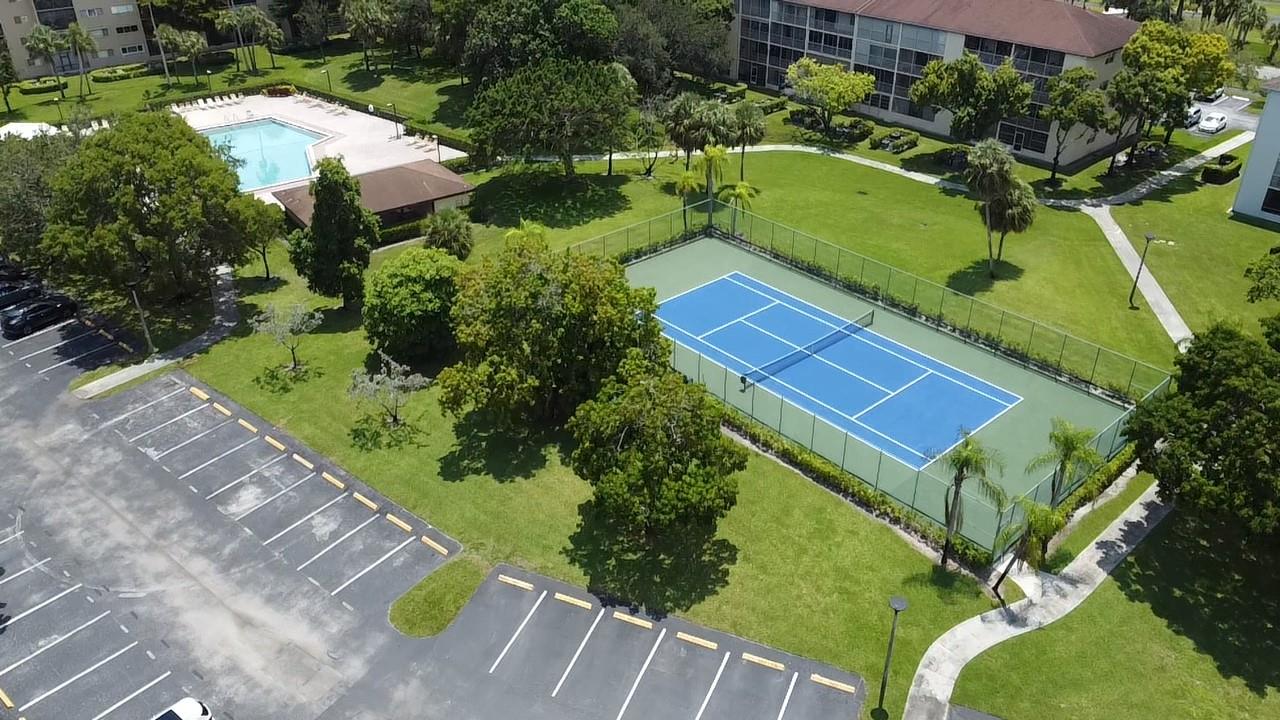 Welcome to this beautifully maintained 1 bed / 1 bath home, where comfort meets style in the heart of Century Village, Pembroke Pines!Step into a warm and inviting space that offers serene water views and a smart layout perfect for everyday living. Enjoy the convenience of an elevator right outside your door and a laundry room just steps away. Located close to major highways, shopping malls, restaurants, and entertainment. Nestled in the highly sought-after 55+ community of Century Village, amenities include swimming pools Tennis & pickleball courts Golf course Fitness centers & gyms Billiards room- multimillion-dollar clubhouse Shuttle transportation 24/7 gated security. This is the perfect opportunity to live in a vibrant, active community with everything you need at your fingertips!