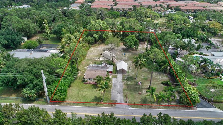 ***RUN, don't walk because this property has not been available in over 40 YEARS!!!! Endless possibilities await with this unique and RARE gem!!! Adorable cottage style remodeled home nestled on 1 acre of lush land. Bamboo floors just installed, brand new electrical panel,newer appliances including the washer and dryer and much more!
Park your cars,boat or RV under the HUGE carport and bonus permitted Ted's shed convey with the property. Property has city water, septic system and oversized wells. BRING your horses and pigs because this is the ''one!'' Zoned Agricultural!! Centrally located and surrounded by shopping, restaurants and highways this is the perfect work,live, enjoy life combination.