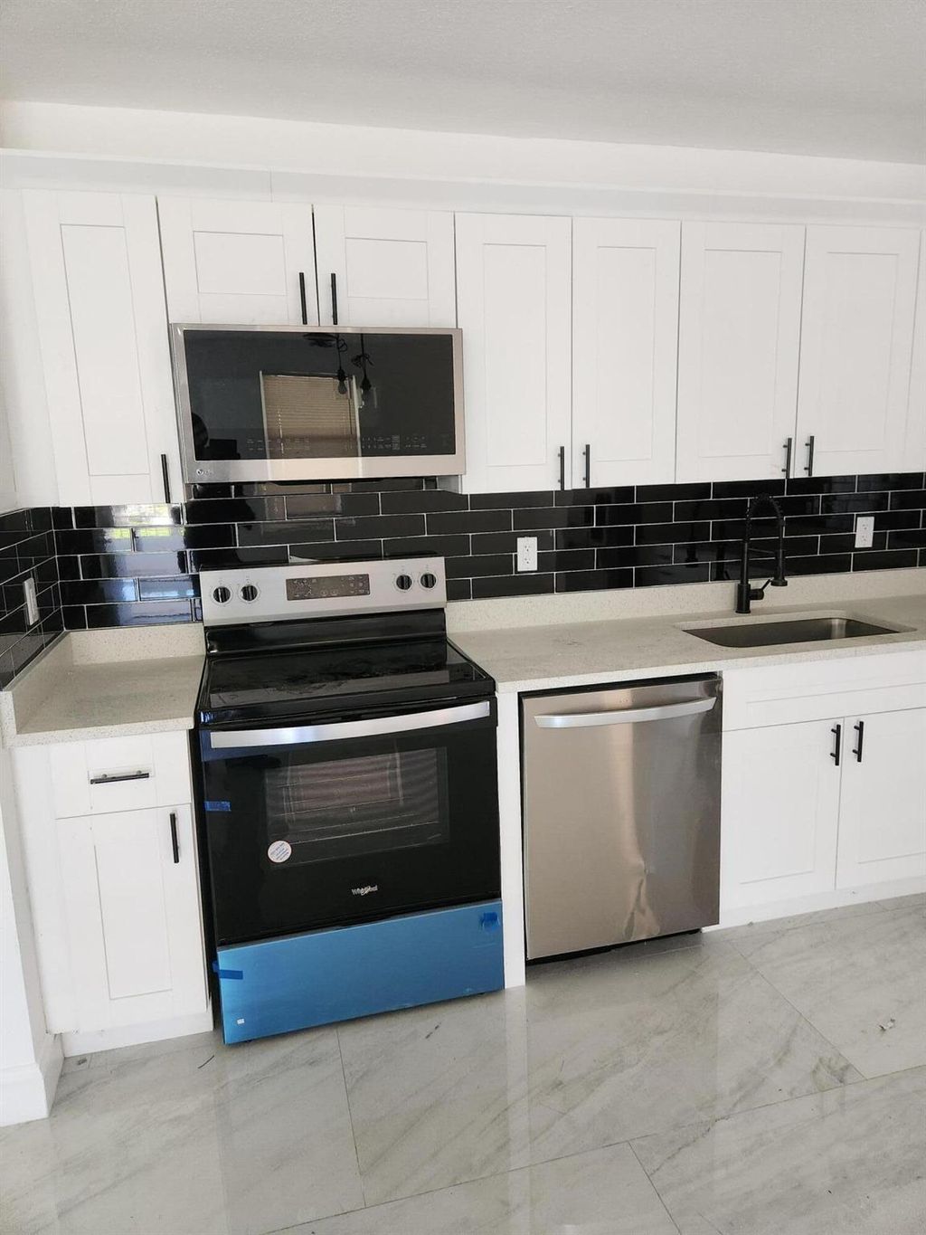 Photo of 609 W 2nd Street, Riviera Beach, FL 33404 (MLS # R11132334)