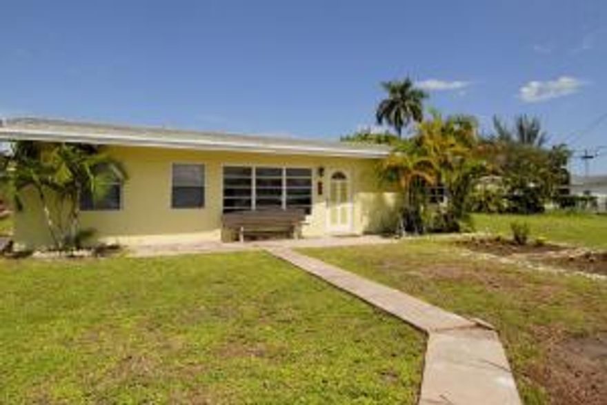 This is a well care for house on a dead end street of Pompano Highland.  House sits on over 10,000 square feet of land, plenty of room for pool or an addition. Strong foundation, house received no damage during Wilma. Connected to city water, sewer is connection ready, price will go up after owner complete the connection. Updated kitchen and bath.  Split bedroom, with washer and dryer. Very clean and ready for move in.  Priced for quick sale but not a handy man. Bring your buyer, motivated seller!!!