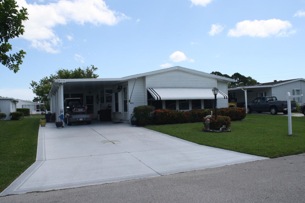Photo of 8372 Gallberry Circle, Port Saint Lucie, FL 34952 (MLS # B26004851)