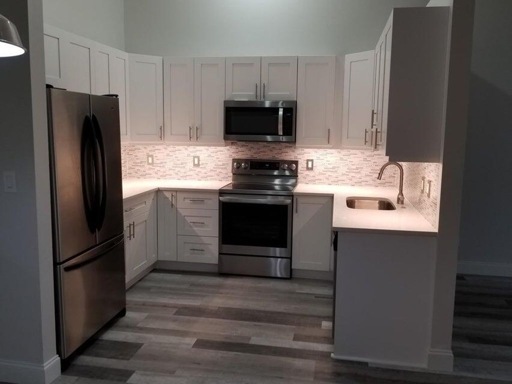 Photo of 6556 Chasewood Drive N #H, Jupiter, FL 33458 (MLS # R10971641)