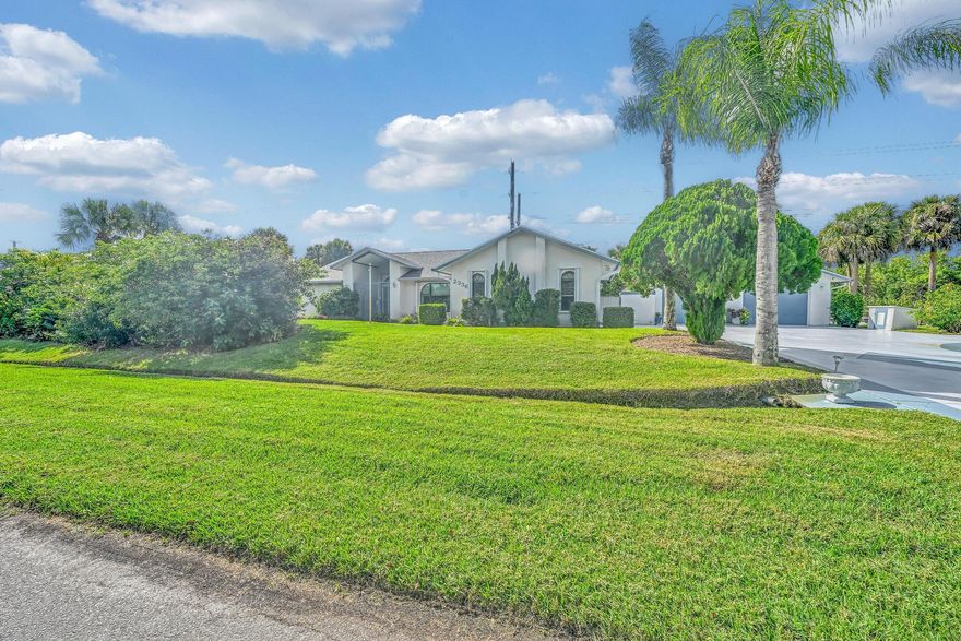 Beautiful 3 bed, 2 bath CBS pool home on a spacious 1/2 acre lot in Port St. Lucie, FL. Enjoy a 32x28 detached extra garage--perfect for hobbies or storage. Home backs up to a serene preserve for privacy and nature views. Features custom hand-crafted cabinetry throughout, a new 2023 roof, and 1600 sq ft of living space. Conveniently located near the interstate for easy commuting. Don't miss this unique opportunity for Florida living with plenty of space and upgrades!