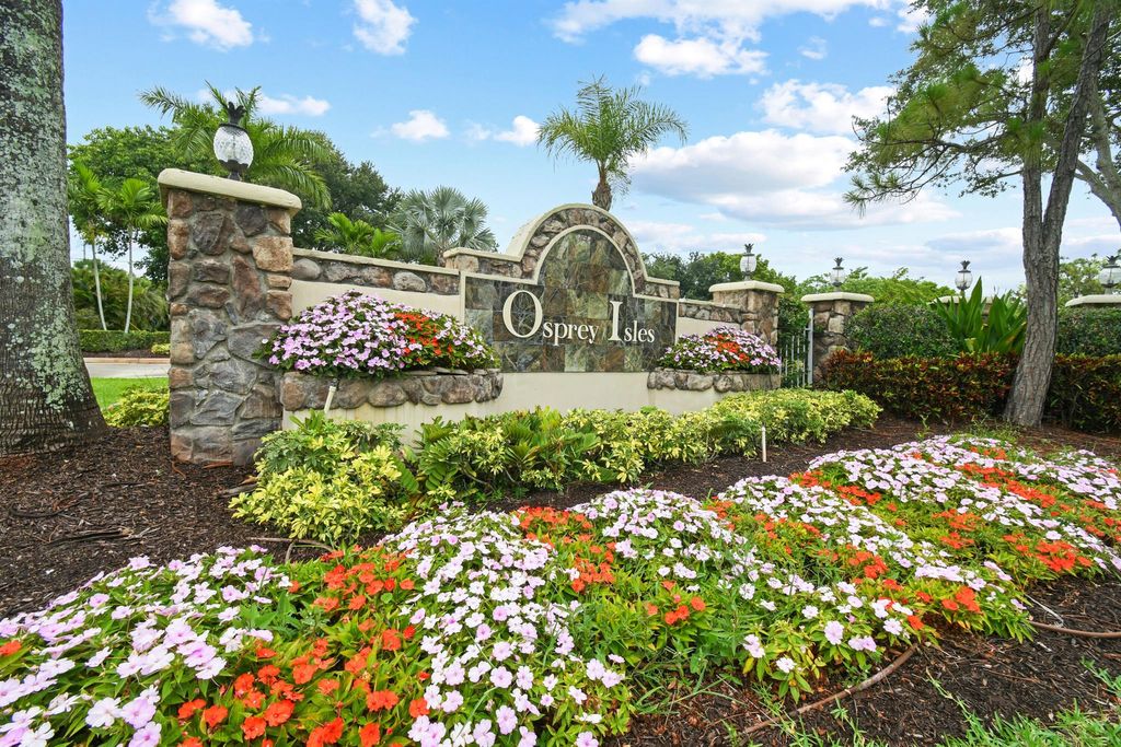 Photo of 11226 Osprey Lake Lane, Palm Beach Gardens, FL 33412 (MLS # R11096906)