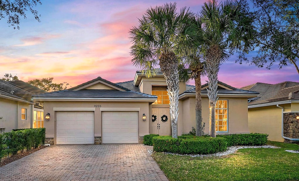 Photo of 11226 Osprey Lake Lane, Palm Beach Gardens, FL 33412 (MLS # R11096906)