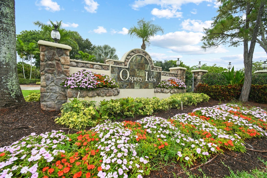 Photo of 11226 Osprey Lake Lane, Palm Beach Gardens, FL 33412 (MLS # R11096906)