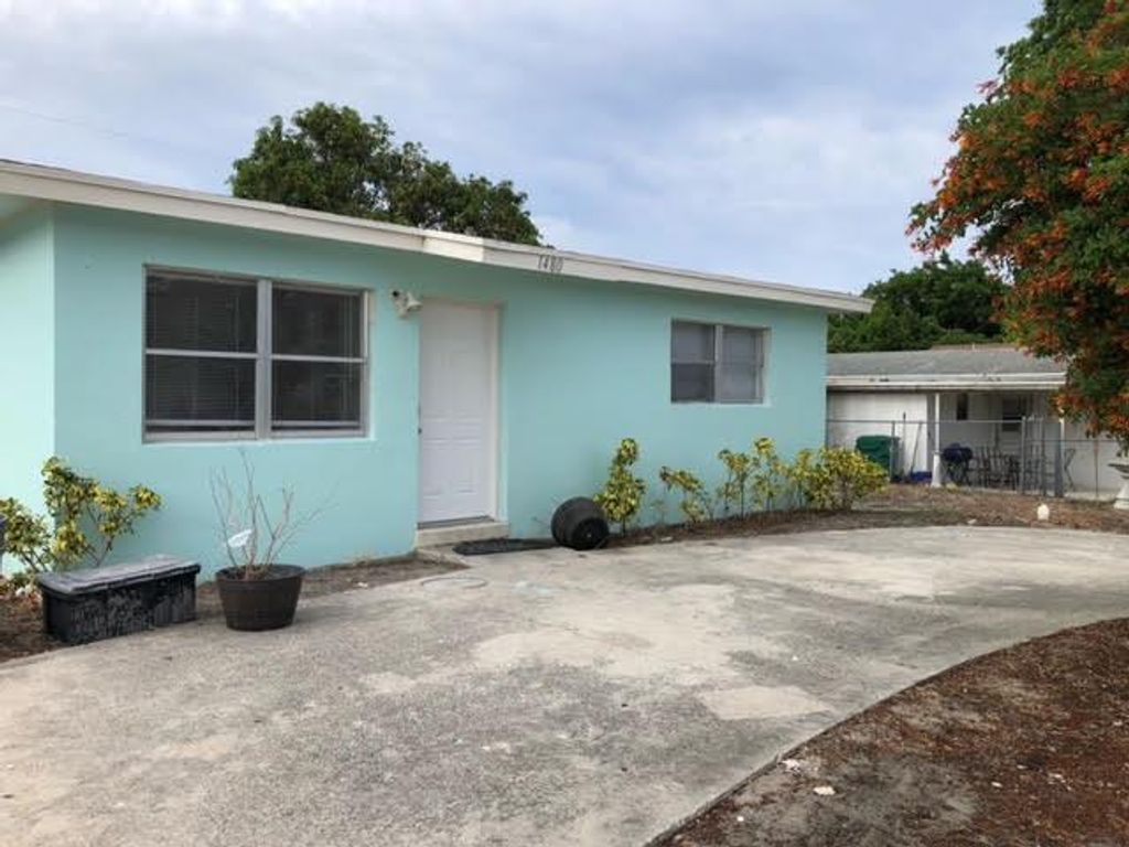 Photo of 1480 W 33rd Street, Riviera Beach, FL 33404 (MLS # R10967410)