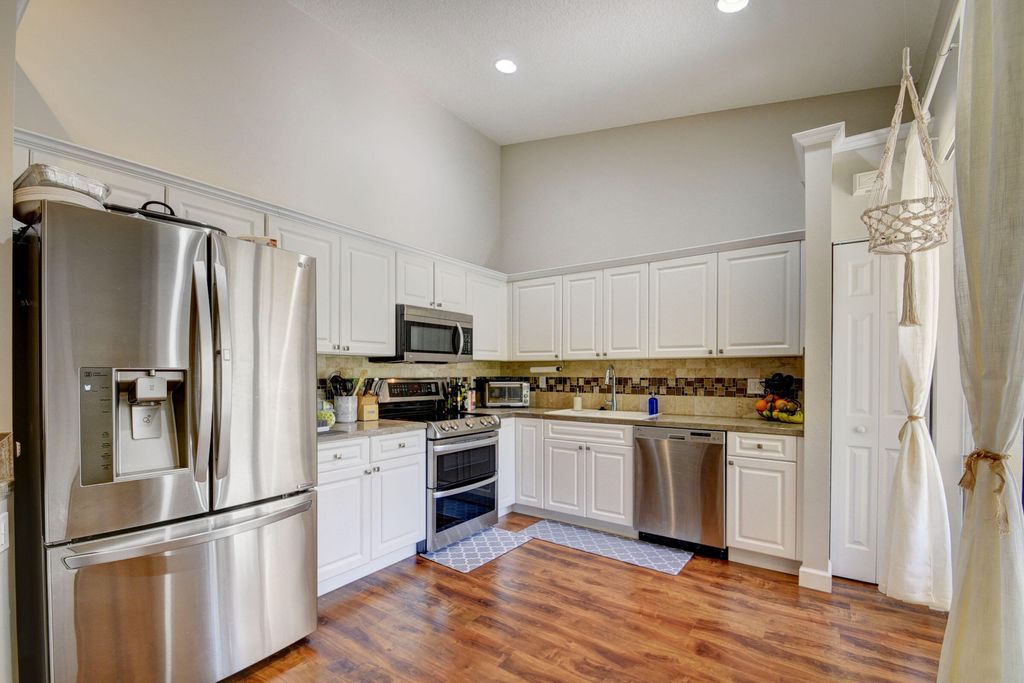Photo of 2187 Umbrella Cay, West Palm Beach, FL 33411 (MLS # R10951718)