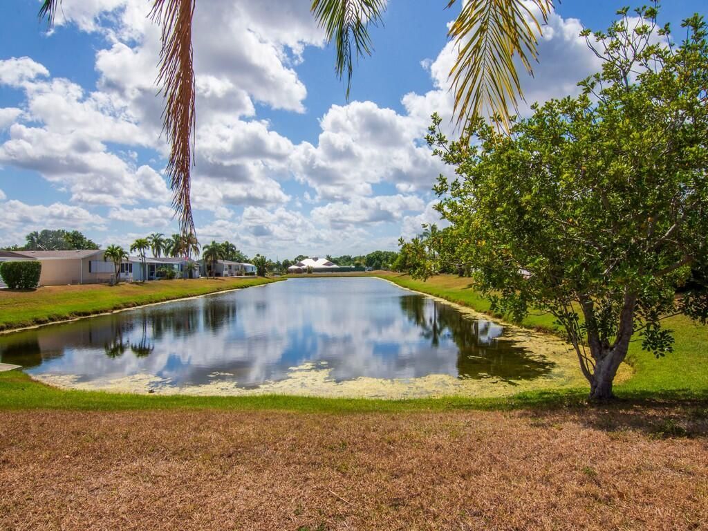 Photo of 416 Tropical Isles Circle, Fort Pierce, FL 34982 (MLS # R10983585)
