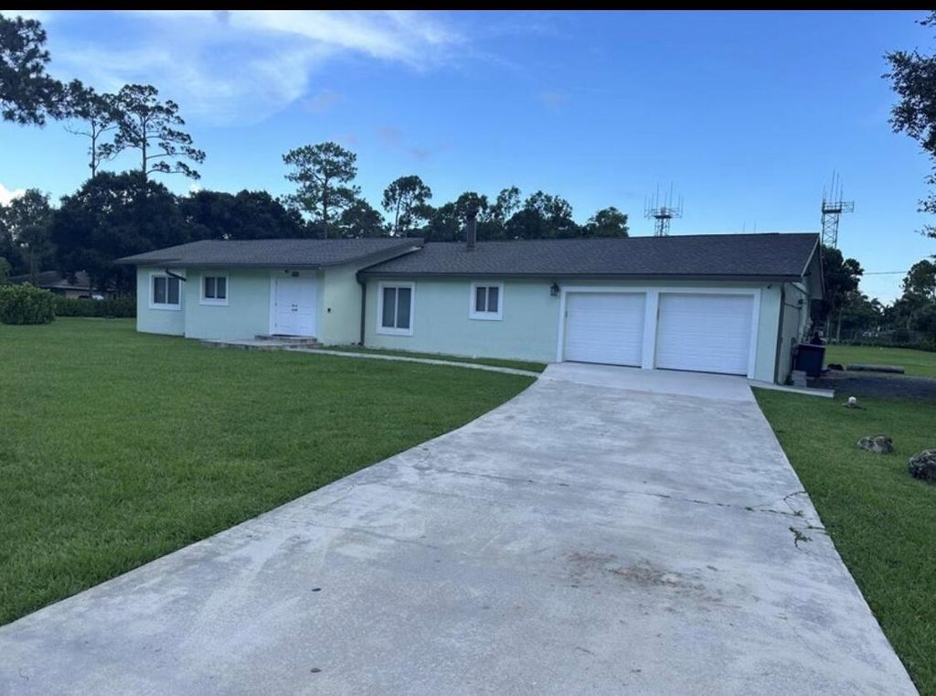 Photo of 8436 Pioneer Road, West Palm Beach, FL 33411 (MLS # R11146641)