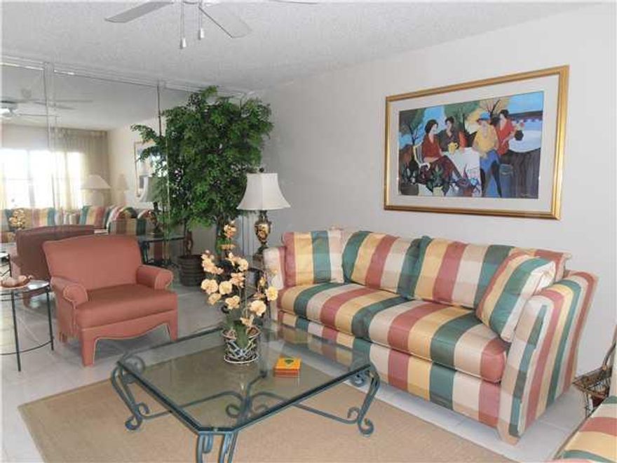 ALL TILED 2 BEDROOM/2 BATHS SPACIOUS 2ND FLOOR UNIT..VERY NICELYDECORATED FULLY FURNISHED..ENCLOSED TILE PATIO WITH ROLL DOWN SHUTTERS..UNIT IS LOCATED ACROSS FROM THE RICHMOND POOL AND TENNIS COURT...GATED COMMUNITY WITH LOTS OF AMENITIES AND COURTESY SH UTTLES..SPECTACULAR CLUBHOUSE FACILITY..ASSOCIATION CLAIMS 55+