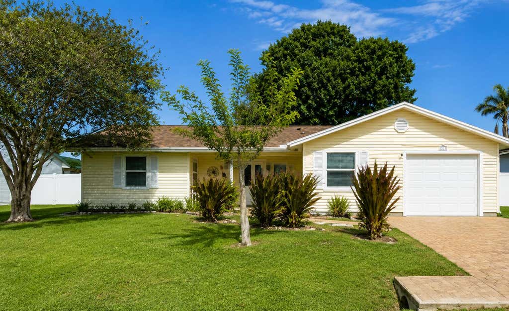 Photo of 2490 SE Whitehorse Street, Port Saint Lucie, FL 34984 (MLS # B26052904)