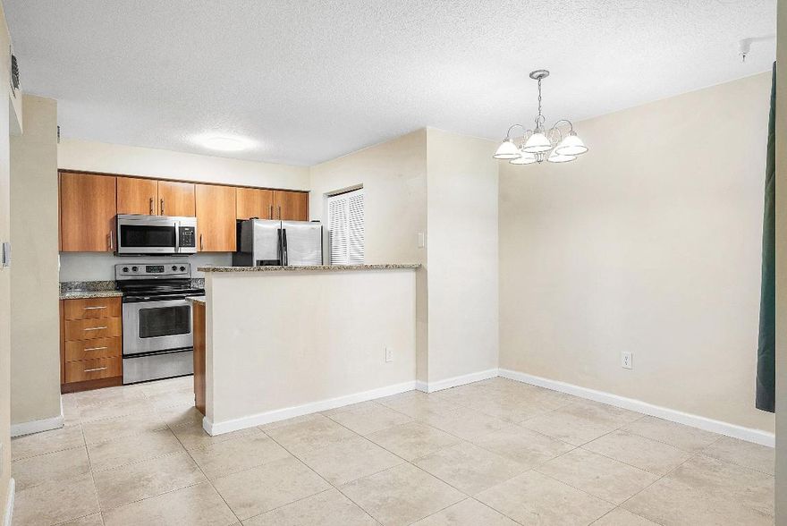 This all-ages 1 bedroom condo is located in the gated neighborhood of Bahia in South Delray; conveniently close to Atlantic Avenue. The community features a gated, pet-friendly environment. Residents enjoy amenities such as a pool, spa, fitness center, and tennis courts, just steps from your front door.

The condo itself is a first-floor unit with an open floor plan. It includes a kitchen with granite countertops and stainless steel appliances, interior laundry facilities, and a spacious walk-in closet. Quick drive to dining, entertainment, beaches, shopping, and I-95, and Boca Raton. Ideal for full-time residents, seasonal living, or investment buyers.