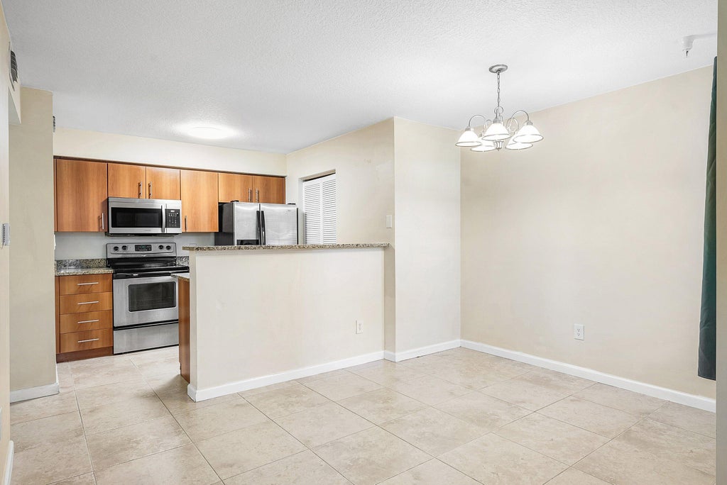 Photo of 1001 Crystal Way #M, Delray Beach, FL 33444 (MLS # R11152352)