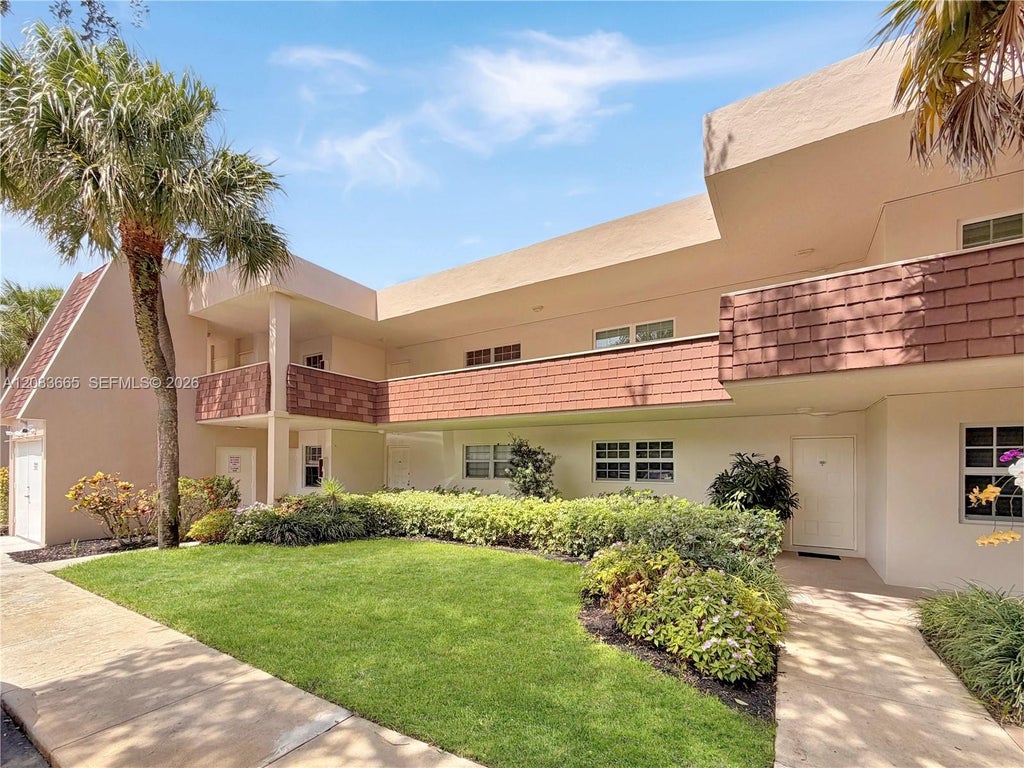 Photo of 3641 Oaks Clubhouse Drive #201, Pompano Beach, FL 33069 (MLS # A12033665)