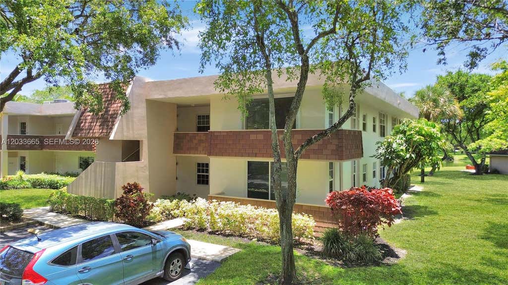 Photo of 3641 Oaks Clubhouse Drive #201, Pompano Beach, FL 33069 (MLS # A12033665)