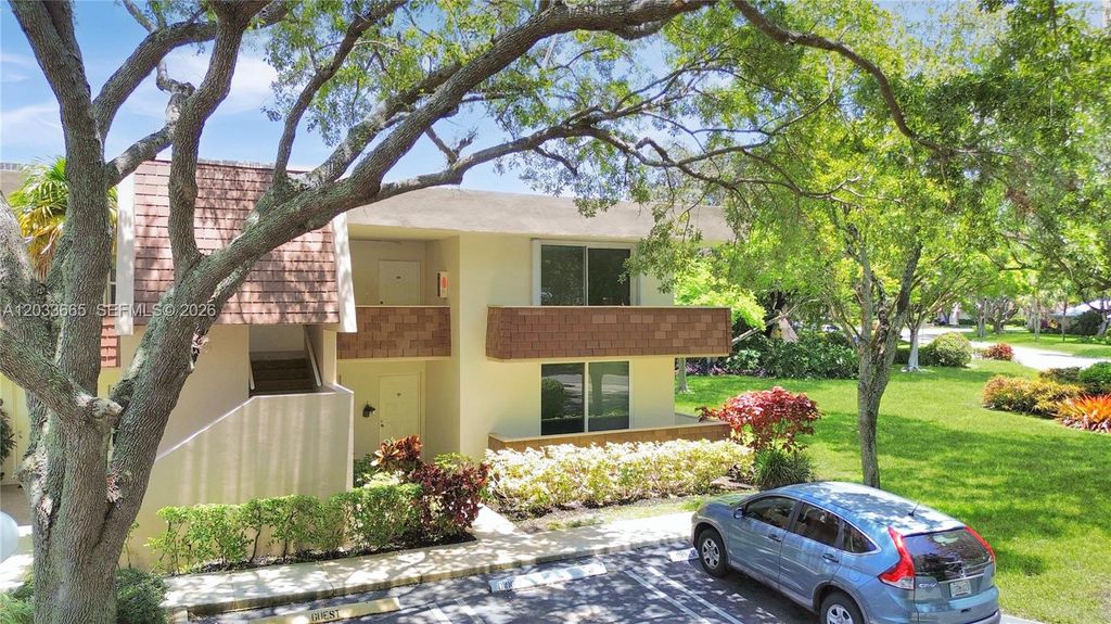 Photo of 3641 Oaks Clubhouse Drive #201, Pompano Beach, FL 33069 (MLS # A12033665)