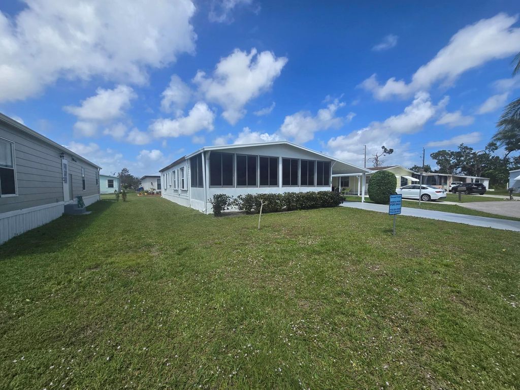 Photo of 9 Flores Del Norte, Fort Pierce, FL 34951 (MLS # R11044914)