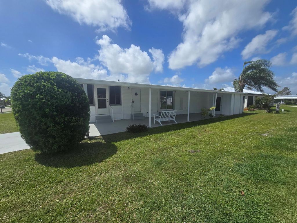 Photo of 9 Flores Del Norte, Fort Pierce, FL 34951 (MLS # R11044914)