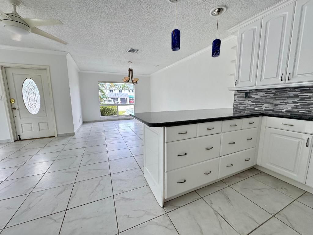 Photo of 620 NE 19th Avenue, Deerfield Beach, FL 33441 (MLS # R11056155)