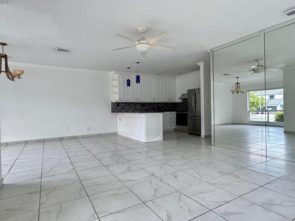 Photo of 620 NE 19th Avenue, Deerfield Beach, FL 33441 (MLS # R11056155)